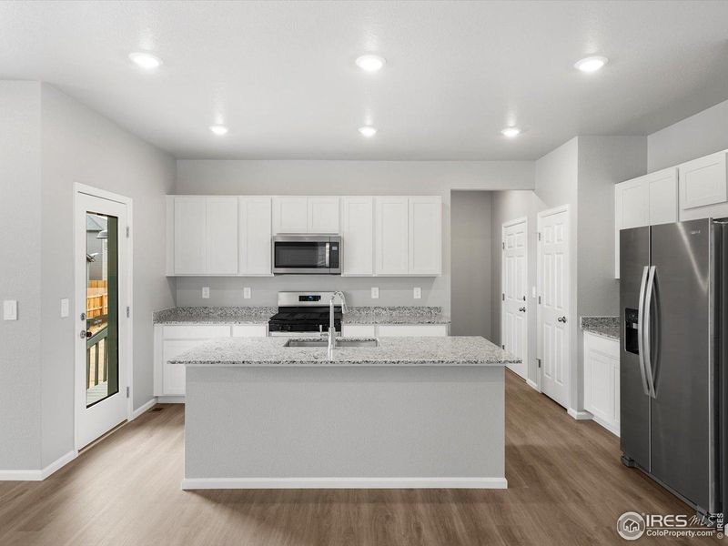Furnished interior view inside a new home in Lake Bluff, Greeley (Image 7).