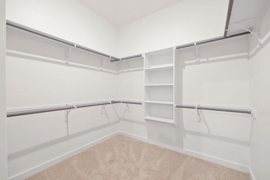 Primary Closet in the Turquoise home plan by Trophy Signature Homes – REPRESENTATIVE PHOTO