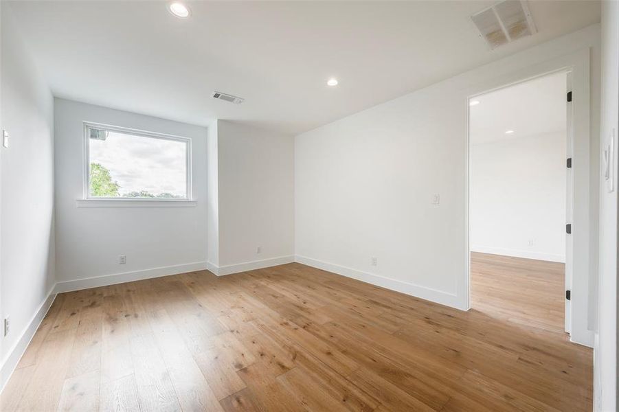Loft/Gameroom room featuring light wood-type flooring and recessed lighting Loft/Gameroom room featuring light wood-type flooring and recessed lighting