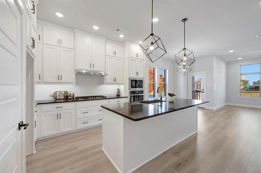 Furnished interior view inside a new home in Hillside at Las Colinas, Irving (Image 13). Furnished interior view inside a new home in Hillside at Las Colinas, Irving (Image 13).
