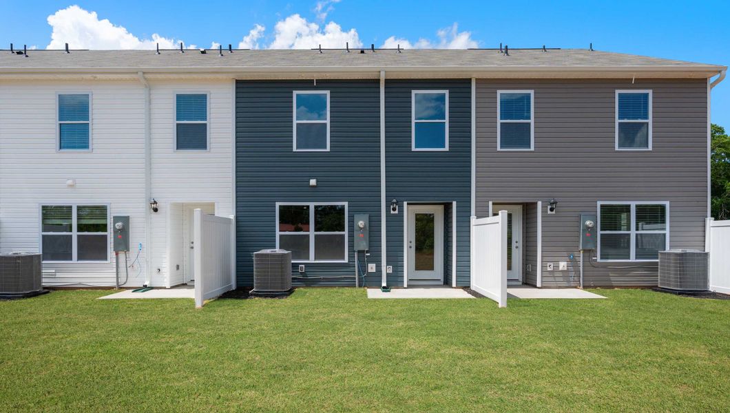 Front exterior of a new home in Tanglewood Townes, Greenville, SC, highlighting curb appeal (Image 2).