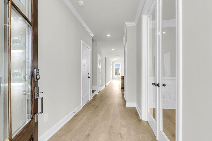 Spacious, unfurnished interior of a new home in Tidewater at Lakes of Cane Bay, Summerville (Image 17).