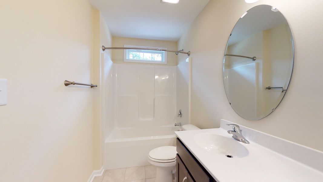 Representative furnished interior of a home built from the Fairfax A by JC Jackson Homes,LLC in Heritage Pointe, Newport (Image 13).