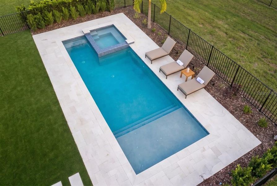 Exterior details and patio area of a home in Bella Collina, Montverde (Image 24).