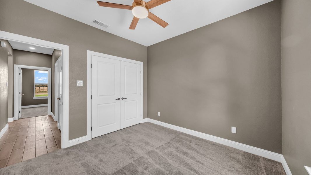 Representative unfurnished interior of a home built from the Clementine by Zeal Home Builders in Saddle Crest Estates, Weatherford (Image 70).