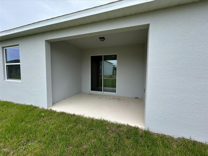 Exterior details and patio area of a home in Trinity Place, St. Cloud (Image 3). Exterior details and patio area of a home in Trinity Place, St. Cloud (Image 3).