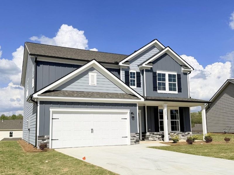 Front exterior of a new home in Sutton’s Landing, Statham, GA, highlighting curb appeal (Image 15).