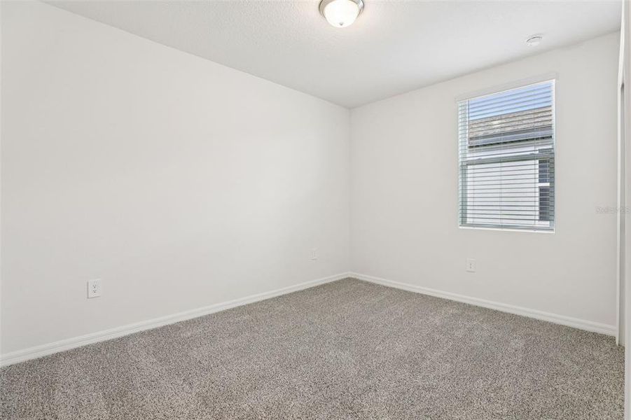 Spacious, unfurnished interior of a new home in Lawson Dunes - Signature Series, Haines City (Image 25).