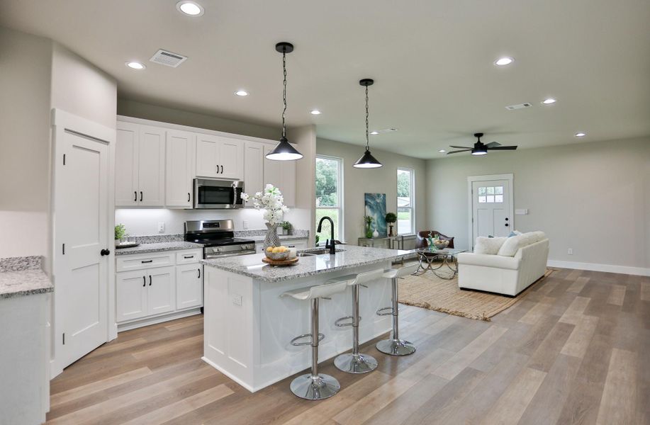 Island with spacious sitting room and storage