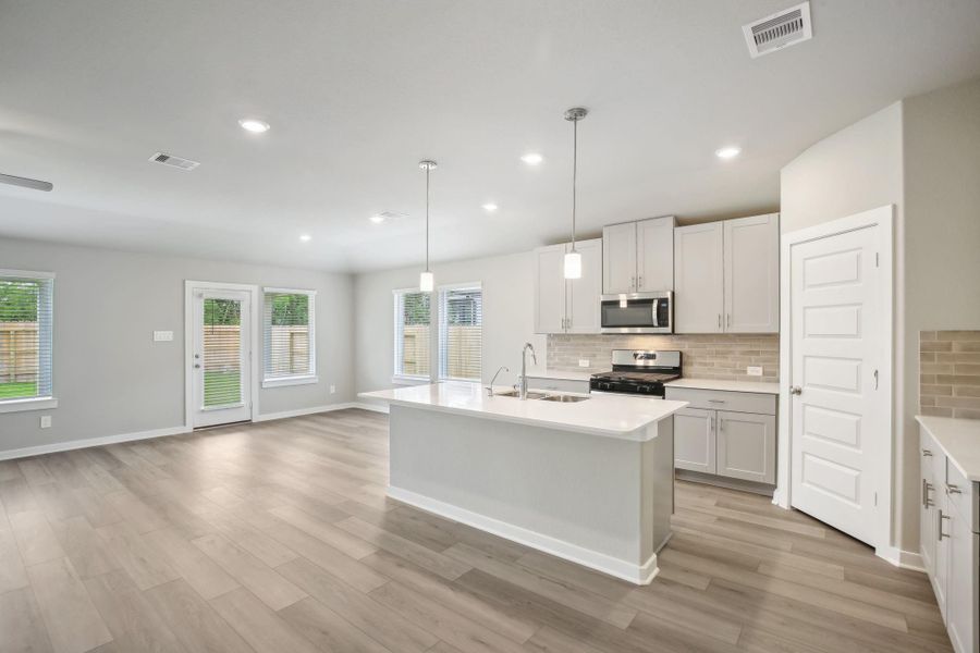 Furnished interior view inside a new home in Massey Oaks - Premier Series, Pearland (Image 17). Furnished interior view inside a new home in Massey Oaks - Premier Series, Pearland (Image 17).