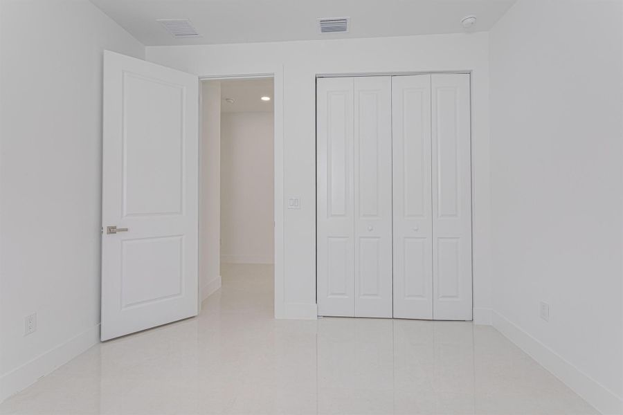 Spacious, unfurnished interior of a new home in , Jupiter (Image 11).