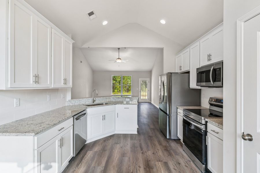 Representative furnished interior of a home built from the The Athens + Bonus Room by Smith Family Homes in NorthShore on the St. Marys River, Kingsland (Image 5).
