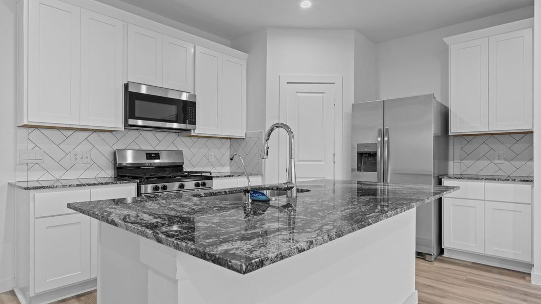 Furnished interior view inside a new home in Watermark, Alvin (Image 5).
