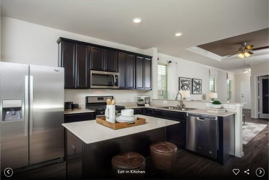 Interior photos- Photo of Pulte model home with same floor plan, not of actual home listed.