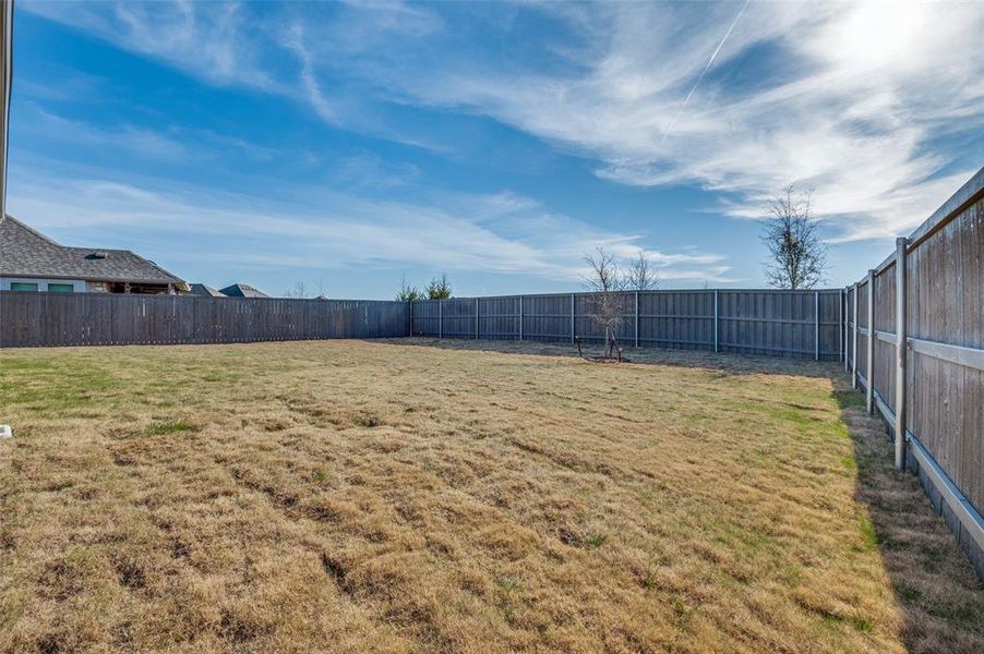 Exterior details and patio area of a home in Prairie Ridge at Goodland, Venus (Image 3).