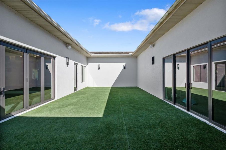 Exterior details and patio area of a home in , San Antonio (Image 28).