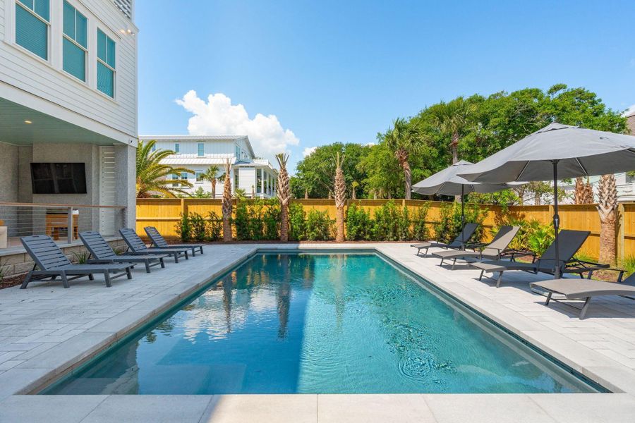 Exterior details and patio area of a home in , Isle Of Palms (Image 40).