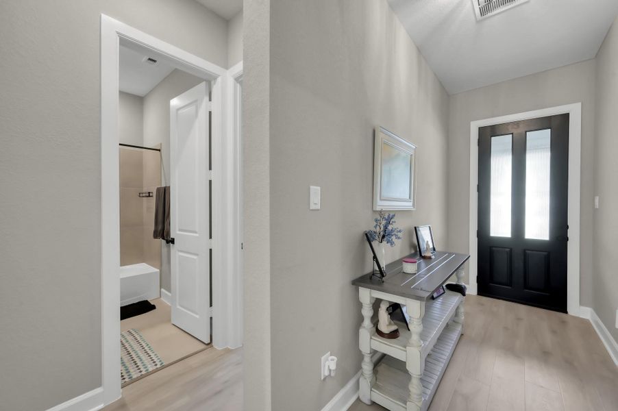 Furnished interior view inside a new home in The Woodlands Hills 60’, Willis (Image 10).