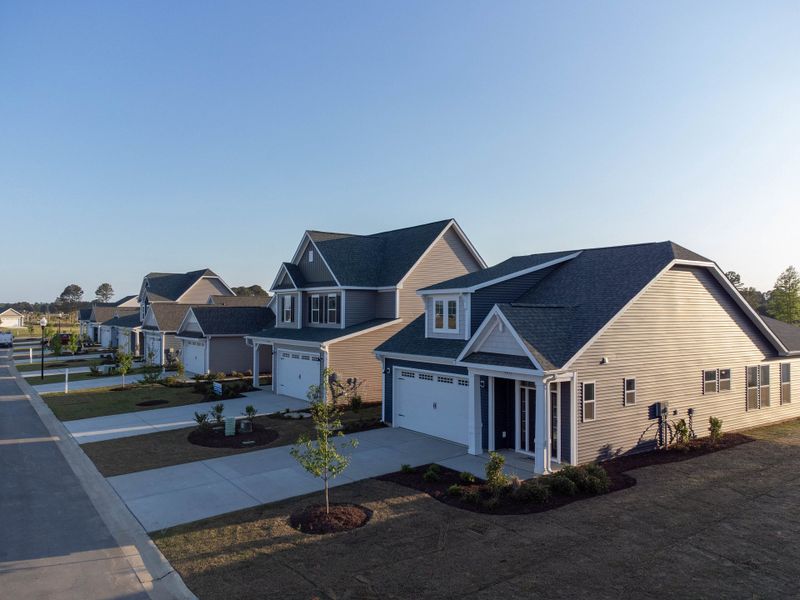 Front exterior of a new home in Coastal Club of the Carolinas, Calabash, NC, highlighting curb appeal (Image 16).