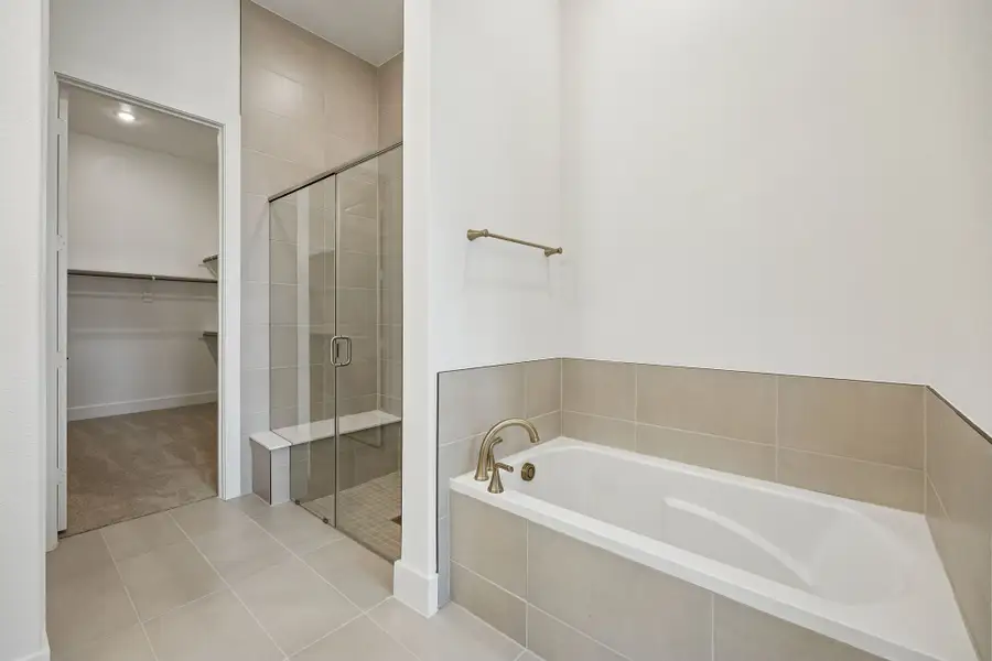 Furnished interior view inside a new home in Newman Village Townhomes, Frisco (Image 15).