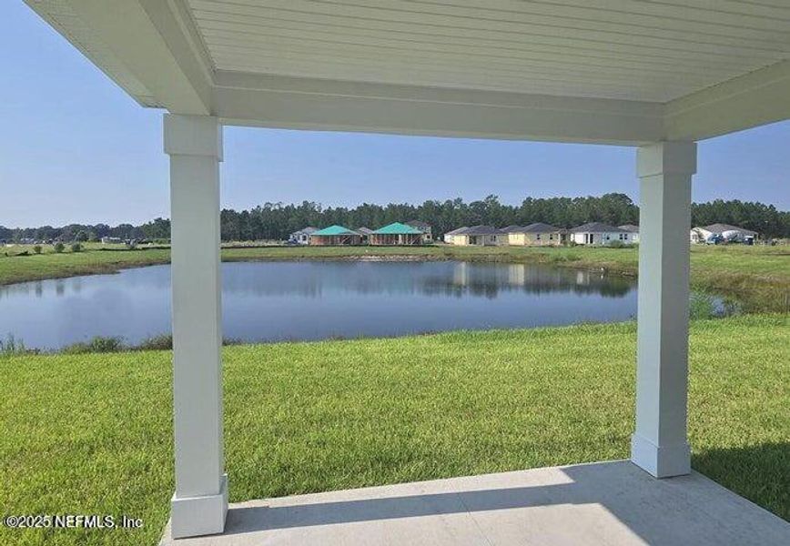 Exterior details and patio area of a home in Lakes at Bella Lago - Signature Series, Green Cove Springs (Image 4). Exterior details and patio area of a home in Lakes at Bella Lago - Signature Series, Green Cove Springs (Image 4).