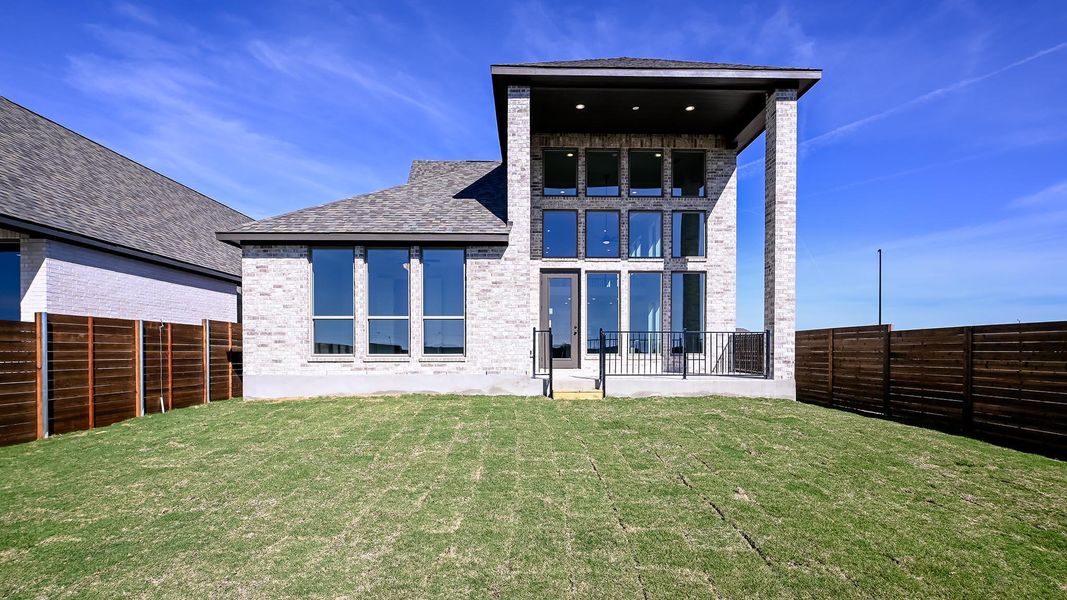 Exterior details and patio area of a home in Juniper Springs, Lockhart (Image 3).