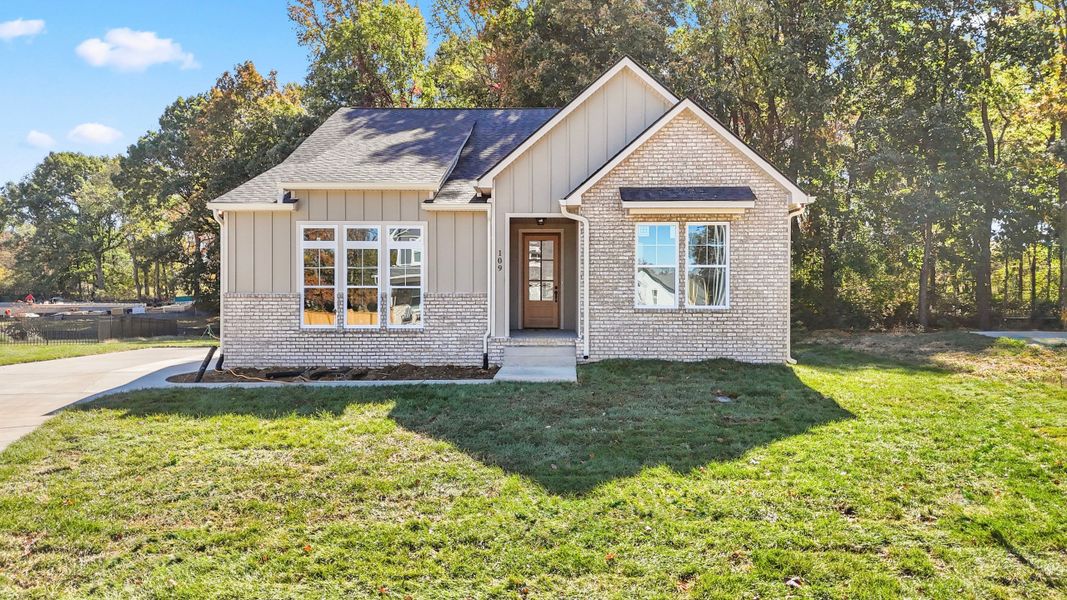 Exterior details and patio area of a home in Cambria, White House (Image 2).