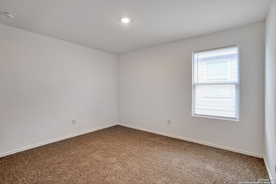 Spacious, unfurnished interior of a new home in Ruby Crossing: Cottage Collection, San Antonio (Image 10).