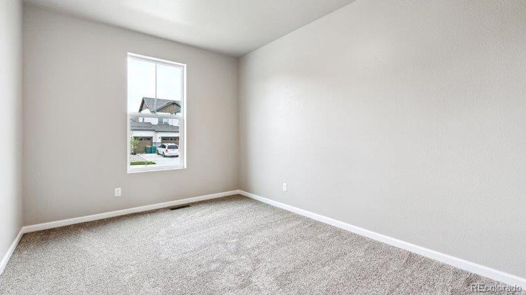 Spacious, unfurnished interior of a new home in Highlands Preserve, Mead (Image 19).