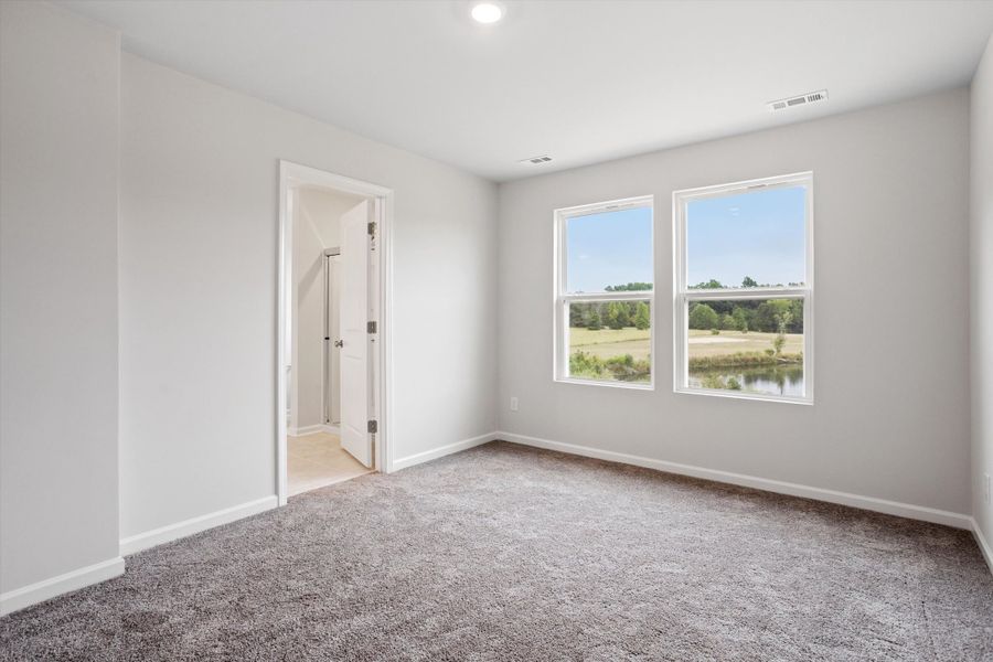 Spacious, unfurnished interior of a new home in Cambridge Reserve, Angier (Image 23).