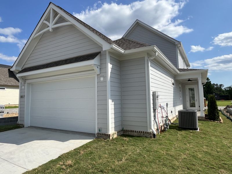Front exterior of a new home in Heritage Walk, Chattanooga, TN, highlighting curb appeal (Image 2).