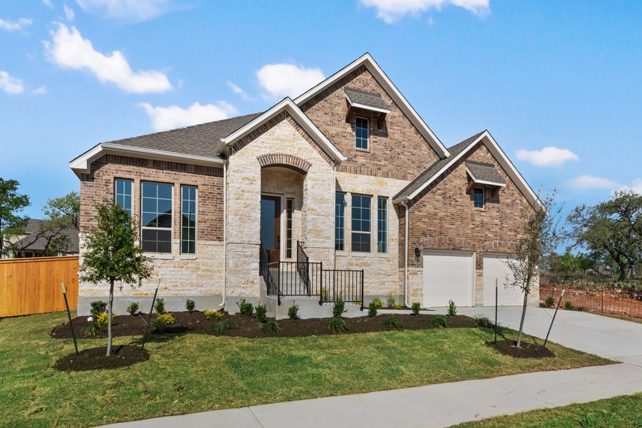 Representative exterior photo of a completed home built from the Maxwell by Ashton Woods in The Estates at La Cima, San Marcos, TX (Image 2). Representative exterior photo of a completed home built from the Maxwell by Ashton Woods in The Estates at La Cima, San Marcos, TX (Image 2).