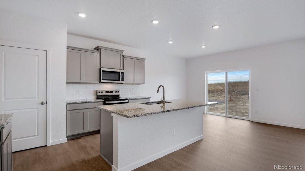 Furnished interior view inside a new home in Settlers Crossing, Commerce City (Image 3).