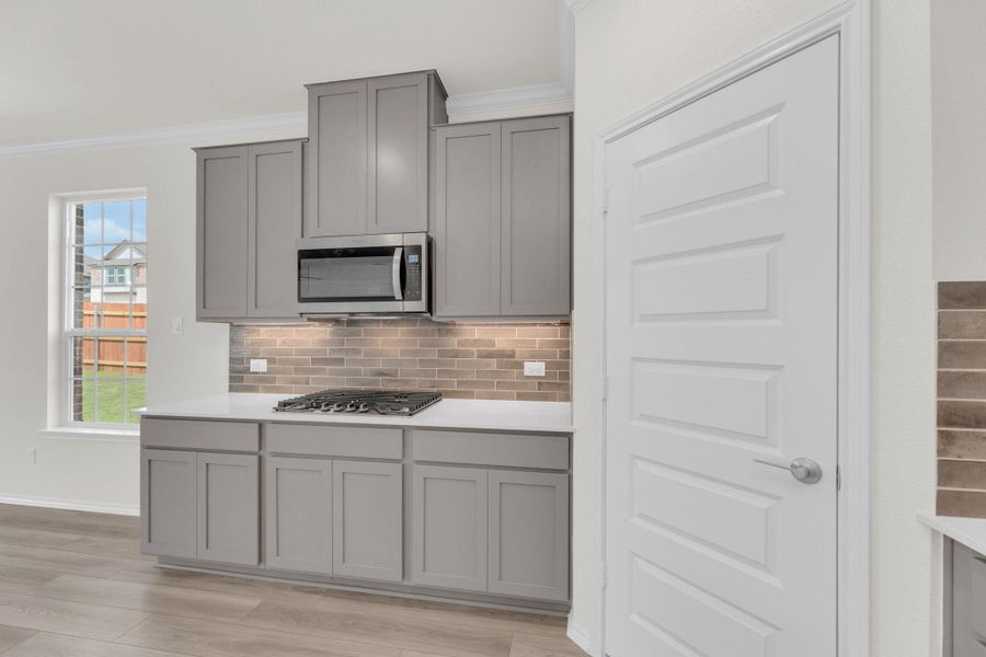 Furnished interior view inside a new home in Salerno - Classic Collection, Round Rock (Image 9). Furnished interior view inside a new home in Salerno - Classic Collection, Round Rock (Image 9).