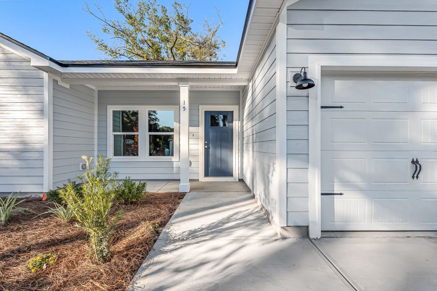 Exterior details and patio area of a home in Live Oak Cottages, Freeport (Image 4). Exterior details and patio area of a home in Live Oak Cottages, Freeport (Image 4).
