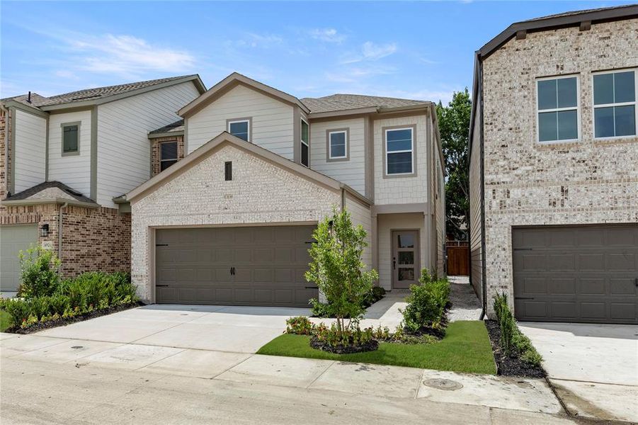 Front exterior of a new home in Sereno Oaks at Buckner Terrace, Dallas, TX, highlighting curb appeal (Image 25). Front exterior of a new home in Sereno Oaks at Buckner Terrace, Dallas, TX, highlighting curb appeal (Image 25).