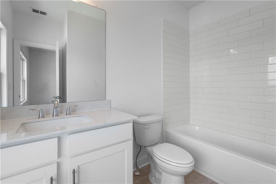 full secondary bathroom with tub/shower - *Pictures represent a previously built home, not the actual home, home is under construction*