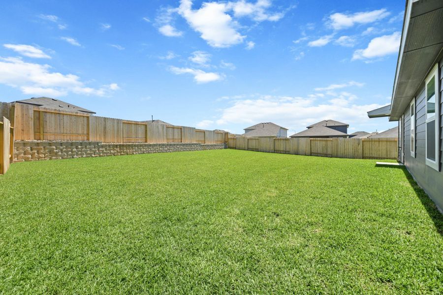 Exterior details and patio area of a home in Mill Creek, Magnolia (Image 3).