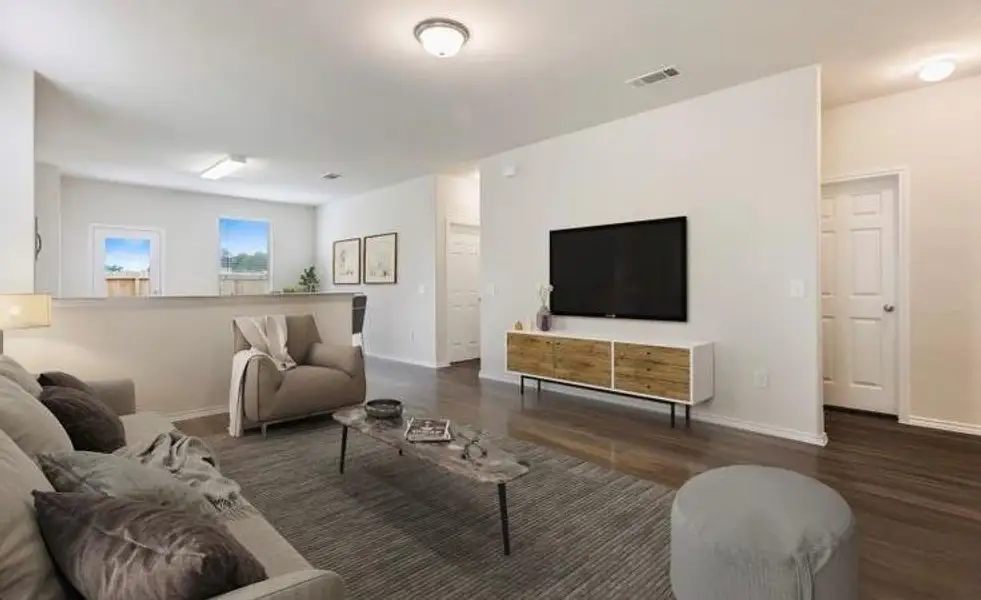 Furnished interior view inside a new home in The Pines At Seven Coves, Conroe (Image 6).