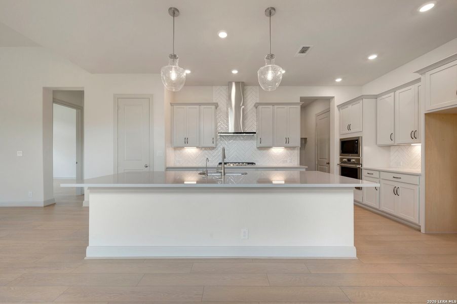 Furnished interior view inside a new home in Windsong - Legacy Series, Boerne (Image 7).