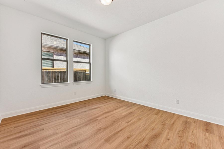 Spacious, unfurnished interior of a new home in 6 Creeks, Kyle (Image 13).