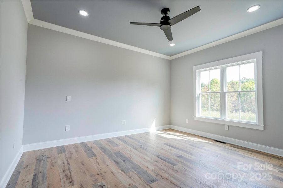 Primary Bedroom with Hunter ceiling fans