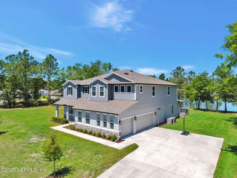 Front exterior of a new home in , Middleburg, FL, highlighting curb appeal (Image 28).