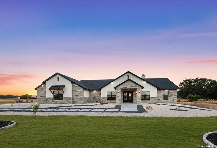 Front exterior of a new home in , Bandera, TX, highlighting curb appeal (Image 24). Front exterior of a new home in , Bandera, TX, highlighting curb appeal (Image 24).