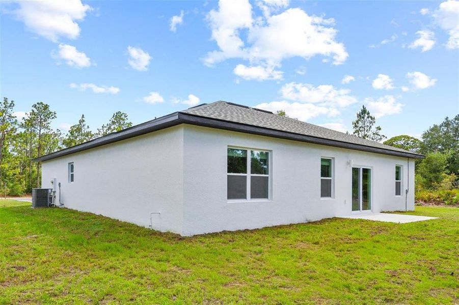 Exterior details and patio area of a home in , Indian Lake Estates (Image 25).