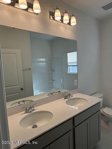 Furnished interior view inside a new home in Brook Forest - Villas, St. Augustine (Image 9).