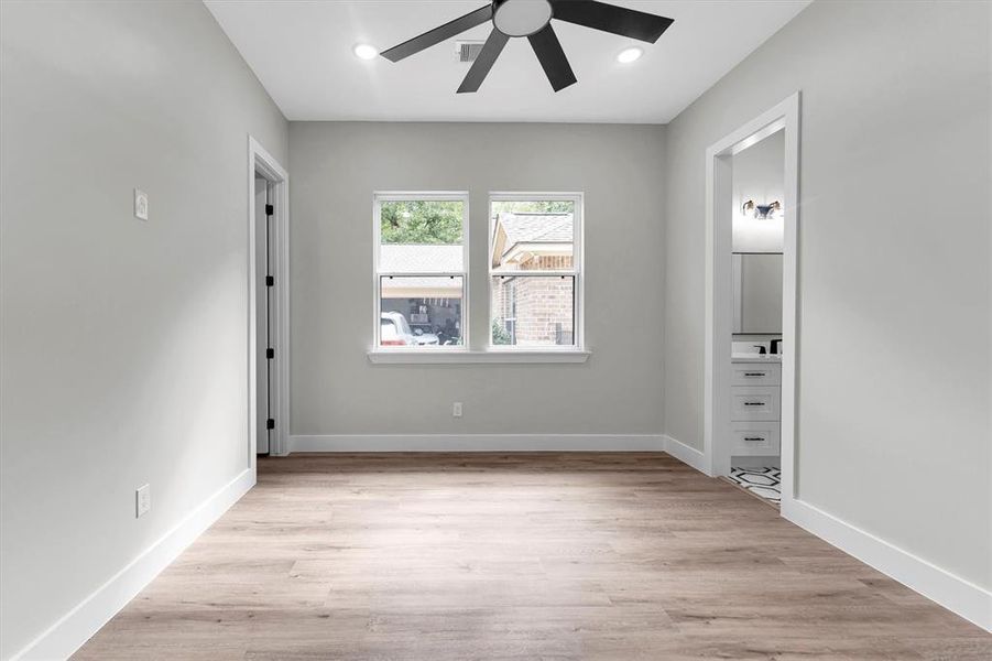 Second bedroom includes access to it's own private vanity with sink