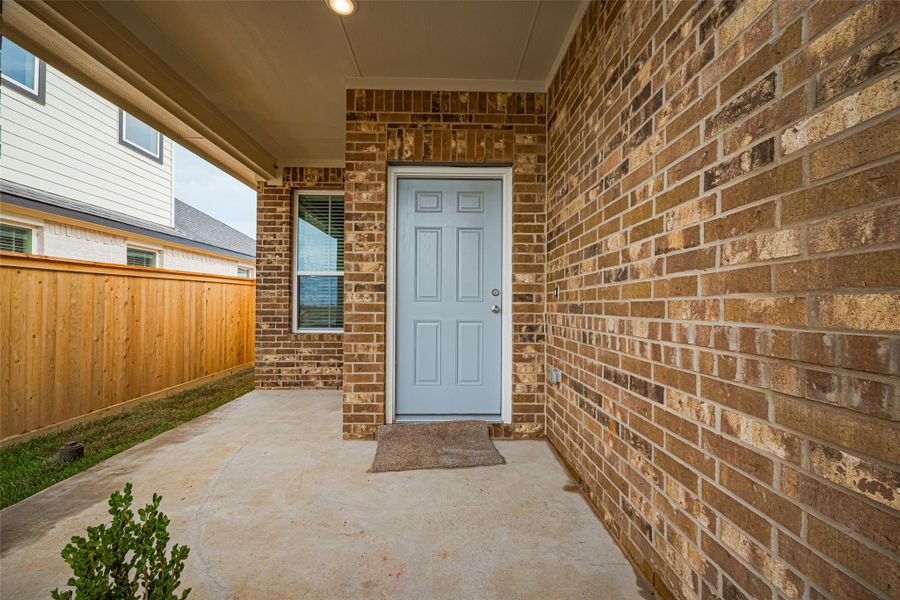 Exterior details and patio area of a home in La Segarra, Brookshire (Image 27).
