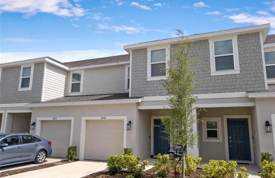 Front exterior of a new home in , St. Cloud, FL, highlighting curb appeal (Image 2). Front exterior of a new home in , St. Cloud, FL, highlighting curb appeal (Image 2).