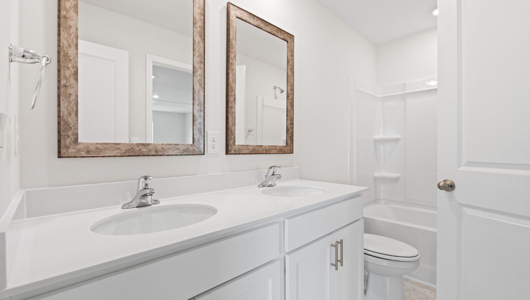 Representative furnished interior of a home built from the BILTMORE by D.R. Horton in Waverly Station, Greenwood (Image 12).